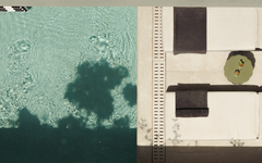 Pool mit Liegen und Tisch von oben fotografiert