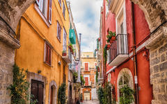 Alleyway in old white town Bari